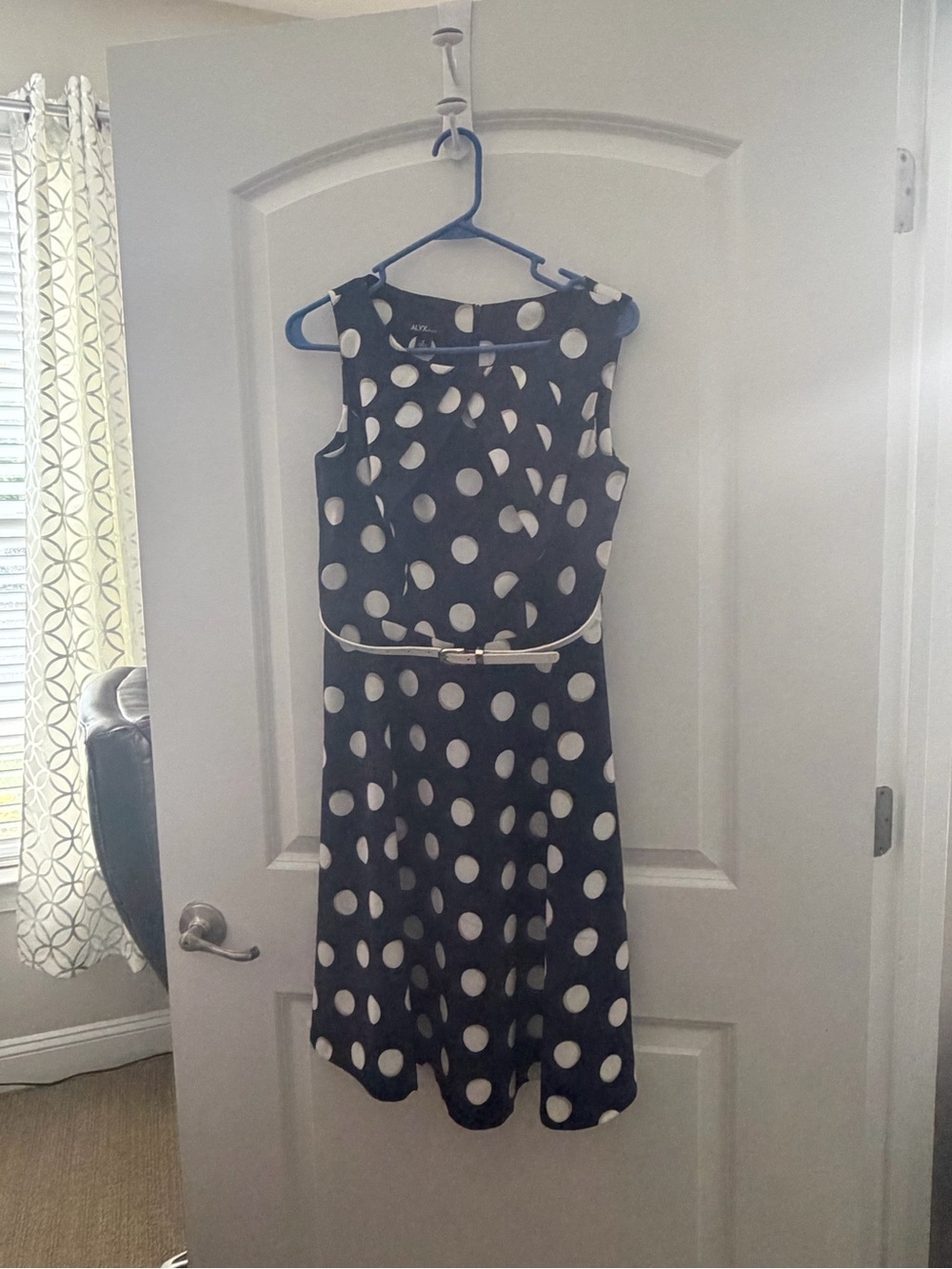 Classic Navy Blue and White Polka Dot Sleeveless Dress